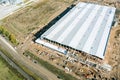 Aerial view of large construction site. industrial building or logistic center under construction Royalty Free Stock Photo