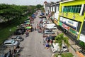 Aerial view of a large crowd of people walking together down a road in Kajang, Malaysia