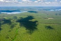 Aerial view of large forest area and distant lake Biale Augustowskie