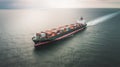 Aerial view of a large, heavy loaded container cargo ship