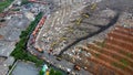 Aerial View. Large landfills like mountains. the tractor take garbage on landfills at Bekasi - Indonesia Royalty Free Stock Photo