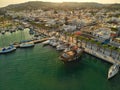 Aerial view of a large maritime vessel docked in a bustling port located in a coastal city Royalty Free Stock Photo