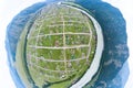 Aerial view of a large number of small houses with colored roofs between mountains near river on an summer sunny day with the road Royalty Free Stock Photo