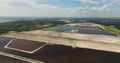 Aerial view of large open air phosphogypsum waste stack near Tampa, Florida. Potential danger of disposing byproduct of