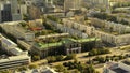 Aerial view of large russian city, buildings, trees and modern glass skyscraper in summer in warm sunny day. Stock
