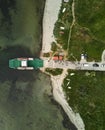 Aerial view of a large vessel docked in a port, with a body of water in the background Royalty Free Stock Photo
