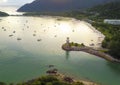 Aerial view of a Lighthouse, boat and yatches docked in marina, Langkawi