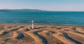 Aerial view of Lighthouse el Far del Fangar on Delta de l'ebre natural park, tarragona, Catalonia, Spain