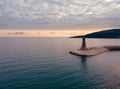 Aerial view of lighthouse at Lustica Bay in Montenegro at sunset light