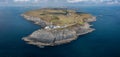 Aerial view of the lighthouse and the Old Head of Kinsale in County Cork of western Ireland Royalty Free Stock Photo