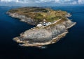 Aerial view of the lighthouse and the Old Head of Kinsale in County Cork of western Ireland Royalty Free Stock Photo