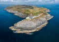 Aerial view of the lighthouse and the Old Head of Kinsale in County Cork of western Ireland