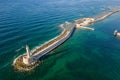 Aerial view of a lighthouse and the old Venetian harbor in the Greek town of Chania on the island of Crete Royalty Free Stock Photo