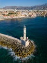 Aerial view of a lighthouse and the old Venetian harbor in the Greek town of Chania on the island of Crete Royalty Free Stock Photo