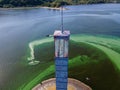 Aerial view of the lighthouse surrounded by algal bloom Royalty Free Stock Photo