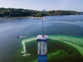 Aerial view of the lighthouse surrounded by algal bloom Royalty Free Stock Photo