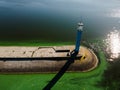 Aerial view of the lighthouse surrounded by algal bloom Royalty Free Stock Photo