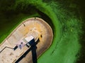 Aerial view of the lighthouse surrounded by algal bloom Royalty Free Stock Photo