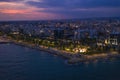 Aerial view of Limassol promenade or embankment with alley and buildings in Cyprus at night. Drone photo of Royalty Free Stock Photo