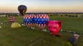 Aerial View of a Line of Hot Air Balloons Getting Ready for an Early Morning Launch