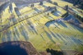 Aerial view of links golf course during summer showing green and bunkers at driving range club house Royalty Free Stock Photo