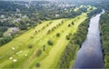 Aerial view of links golf course during summer showing green and bunkers at driving range Royalty Free Stock Photo