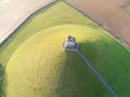 Aerial view of The Lion`s Mound with farmland around.