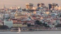 Aerial view of Lisbon skyline with Amoreiras shooping center towers timelapse from Almada at sunset. Lisbon, Portugal Royalty Free Stock Photo