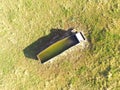 Aerial view of livestock water trough.