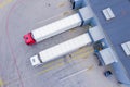 Aerial View of Loading Warehouse with Semi Trucks Parked Royalty Free Stock Photo