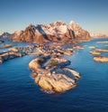 Aerial view at the Lofoten islands, Norway. Mountains and sea during sunset. Royalty Free Stock Photo