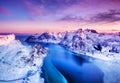 Aerial view at the Lofoten islands, Norway. Mountains and sea during sunset.