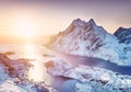 Aerial view at the Lofoten islands, Norway. Mountains and sea during sunset. Royalty Free Stock Photo