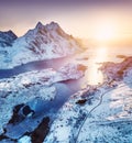 Aerial view at the Lofoten islands, Norway. Mountains and sea during sunset. Natural landscape from air at the drone Royalty Free Stock Photo