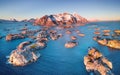 Aerial view at the Lofoten islands, Norway. Mountains and sea during sunset. Royalty Free Stock Photo