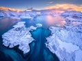 Aerial view of Lofoten islands in winter at sunset in Norway