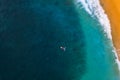 Aerial view of the longboard surfer