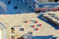 Aerial view looking directly down over red chairs