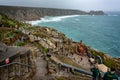 Aerial view looking down at the stage of the Minack Theatre with a stormy sea in Cornwall