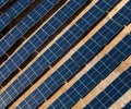 Aerial view looking straight down onto a Solar farm with rows of solar panels. Royalty Free Stock Photo