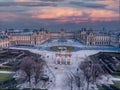 Aerial view of Louvre museum in Paris, France with glass pyramide and dramatic sky Royalty Free Stock Photo