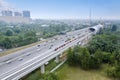 Aerial view of LRT train next to a tollway Royalty Free Stock Photo