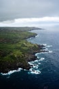 Aerial view of a lush green and blue landscape featuring a vast expanse of ocean and lush green land Royalty Free Stock Photo