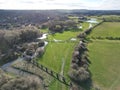 Aerial view of lush green landscape with winding meandering streams in Buckingham Park