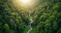 Aerial View of Lush Green Waterfall in Tropical Forest Royalty Free Stock Photo