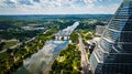 Aerial view of lush greenery along the riverbank in Austin. Texas, USA