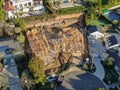 Aerial view of luxury wood type villa under construction.