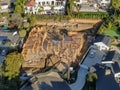 Aerial view of luxury wood type villa under construction.
