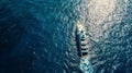 Aerial view of luxury yacht cruising on the sea