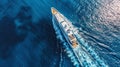 Aerial view of luxury yacht cruising on the sea